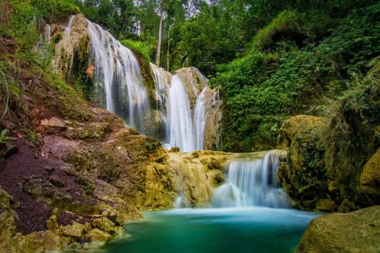 Kulonprogo waterfalls with clear flowing water