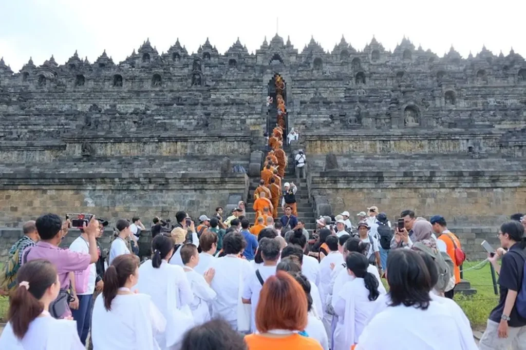 Buddhist monks and devotees do Vesak rituals