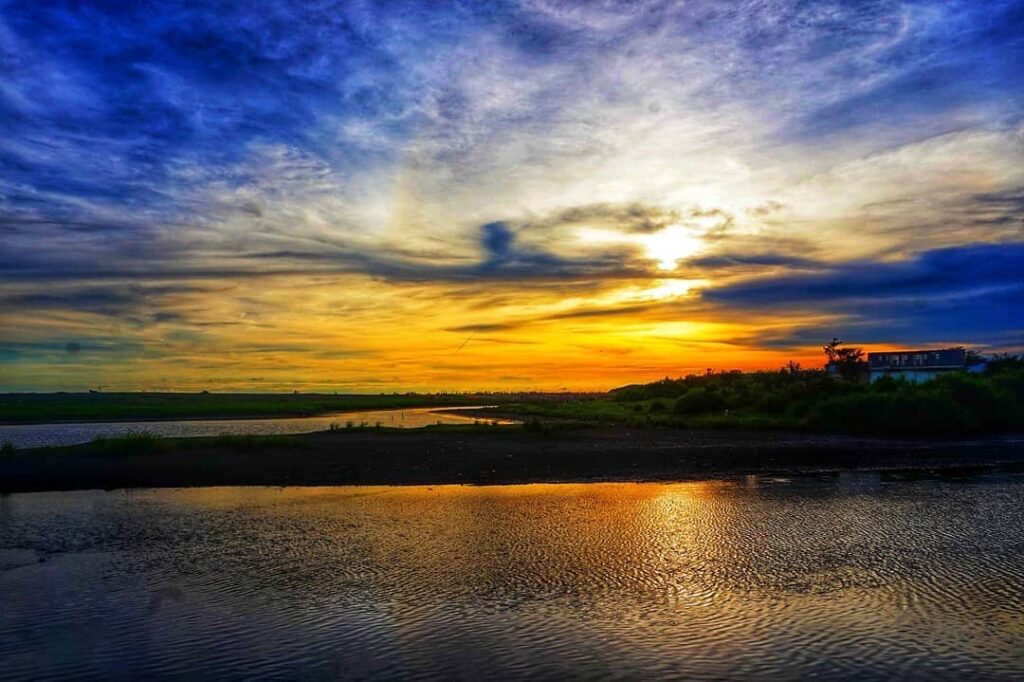 Sunset view seen at Timang Beach, Yogyakarta