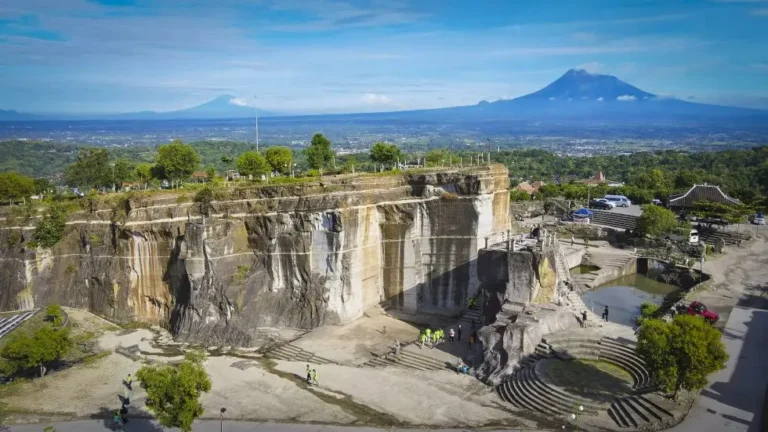 Towering limestone cliffs at Breksi Cliff, Yogyakarta