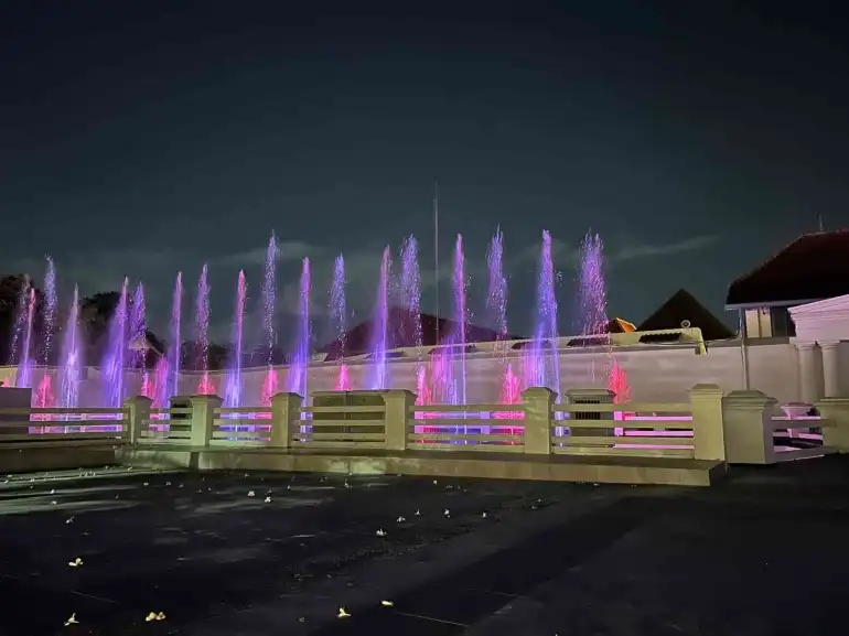 Water fountain attraction at Vredeburg Fort Museum at night